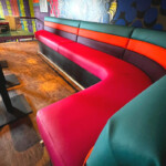multi coloured seating area in a bar