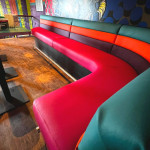 multi coloured seating area in a bar